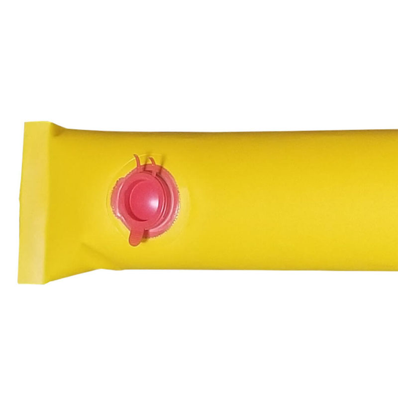 Red screw cap on a yellow flood barrier